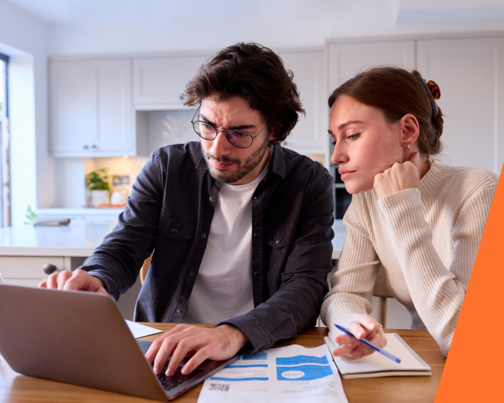 Homeowner reviewing finances at home while considering a Second Charge mortgage option