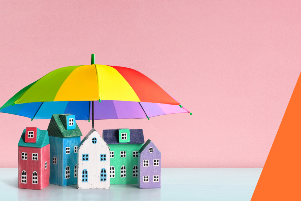 House protected by a brightly coloured umbrella, symbolising life insurance vs mortgage protection.