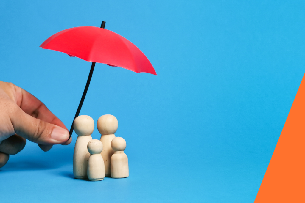 Mortgage adviser discussing how much mortgage insurance you need with a couple at a kitchen table, illustrating cover options and family protection.