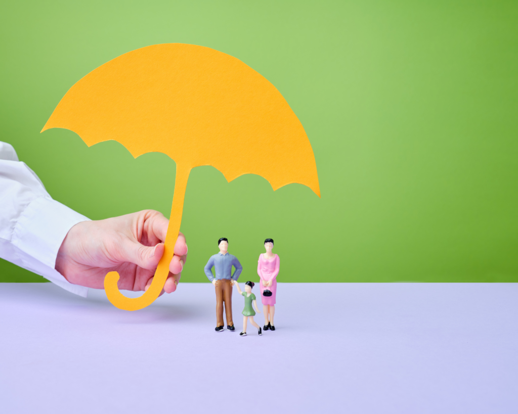 an image of an umbrealla over a family representing life insurance when remortgaging